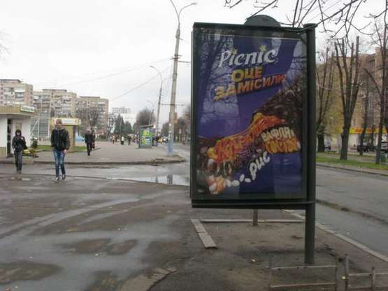 Фото рекламной плоскости по адресу Шевченка бульв., 242 - Симоненко вул.