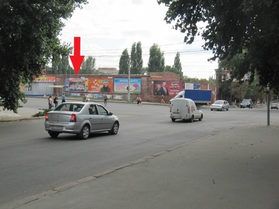 Фото рекламної площини за адресою Чикаленка Евгения ул. -  Кавалерейськая ул. (Медведева ул. - Орджоникидзе ул. (левый)), (БЦ "Акустика", "Ельворти", ПриватБанк, "Експоцентр", УкрСибБанк), в направл. ул. В.Черновола