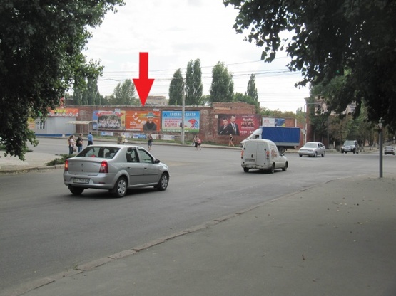 Фото рекламної площини за адресою Чикаленка Евгения ул. -  Кавалерейськая ул. (Медведева ул. - Орджоникидзе ул.) (правый), (БЦ "Акустика", "Ельворти", ПриватБанк, "Експоцентр", УкрСибБанк), в направл. ул. В.Черновола