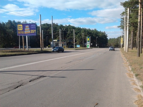 Фото рекламної площини за адресою Короленко ул. (на разделителе), (100м. К АЗС "ОККО") выезд из города на Черкассы