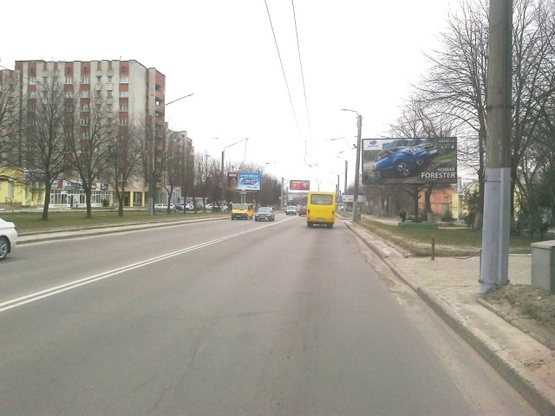 Фото рекламной плоскости по адресу Великого В.ул., 54 (150м к перекрестку с ул. Кульпарковской), (АЗС "ОККО", пиццерия "Челентано", СТО, Львовский проэктный Ин-т), в направл. ул. И.Выговского