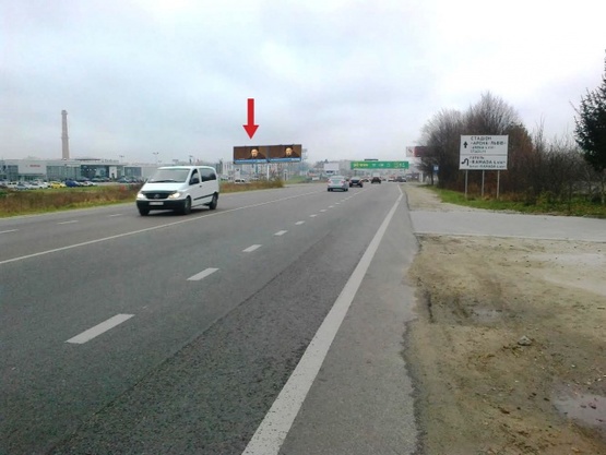 Фото рекламной плоскости по адресу Городоцкая ул., 302, левая ("Эпицентр", "МЕТРО", АЗС "Атмосфера Центр", ресторан "Пицца на дровах", мебельный салон "Три слона", въезд к автосалонам "Хонда", "Тойота"), в направл. ул. Городоцкой