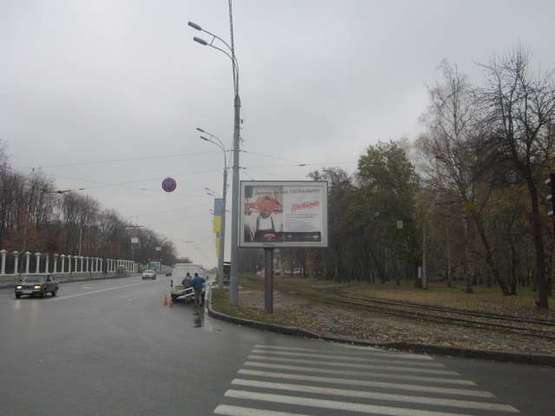 Фото рекламной плоскости по адресу Сумська вул. - 1-го Травня пл.