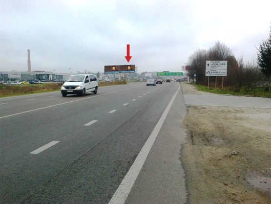 Фото рекламной плоскости по адресу Городоцкая ул., 302, правая ("Эпицентр", "МЕТРО", АЗС "Атмосфера Центр", ресторан "Пицца на дровах", мебельный салон "Три слона", въезд к автосалонам "Хонда", "Тойота"), в направл. ул. Городоцкой