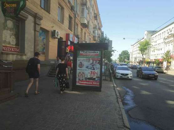 Фото рекламной плоскости по адресу Пушкінська вул., 50/52 (зупинка)