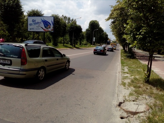 Фото рекламной плоскости по адресу Вашингтона ул., 6, (маркет "Степ", магазин "Babyzone", гипермаркет "МЕТРО"), в направл. ул. Зеленой