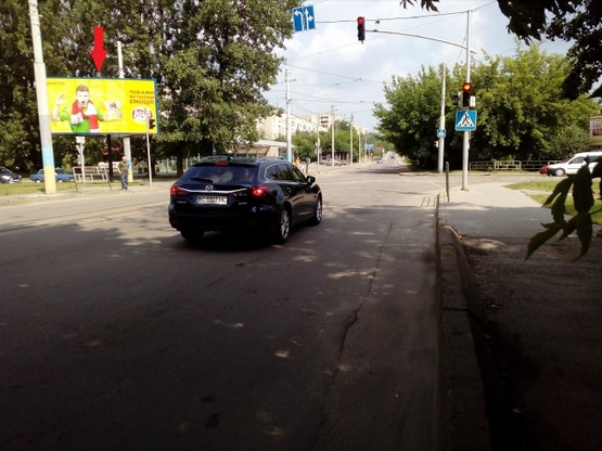 Фото рекламной плоскости по адресу Линкольна ул. - Миколайчука ул., (перекресток), (маркет "Барвинок", ТЦ "Континент", конечная трамвая, ОщадБанк, автостоянка), в направл. из города