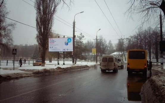 Фото рекламной плоскости по адресу Кондратьева Герасима ул. (Кирова ул) - Гамалия ул. (Пиццерия "Venecia", Храм Иоанна Русского, Афганский сквер, ОщадБанк), в направл. центра города