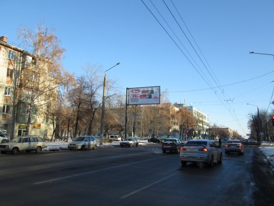 Фото рекламної площини за адресою Александровский просп.- Генерала Момота ул. (Косиора просп. - Третьего интернационала ул.) (перекресток), (маркет "АТБ", городская больница №25, Харьковэнергоприбор), в сторону выезда из города