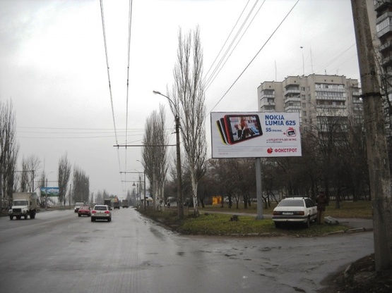 Фото рекламной плоскости по адресу 30-летия Победы ул., 40 (гипер-маркет "Эпицентр", маркет "Фокстрот", "АТБ", "Fresh Market", автосервис), направл. Кольцо Рустави