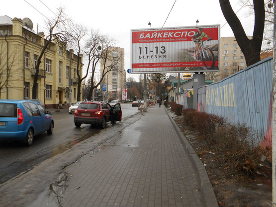 Фото рекламной плоскости по адресу ул.Овруцкая/ул.Баггоутовская (призма), ТЦ "Променада"