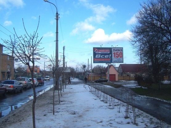 Фото рекламной плоскости по адресу Вячеслава Черновола  (Энгельса) ул. - Чайковского ул.(перекресток), (Продуктовый и Вещевой рынки, СТО, кафе "VEST"), в направл.к бул.Шевченко