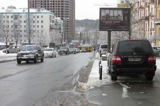 Фото рекламной плоскости по адресу Коновальця Євгена вул. (Щорса вул.), 7/9 (№2 в напр. Червоноармійської)