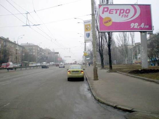 Фото рекламной плоскости по адресу бул.Дружбы Народов, 6