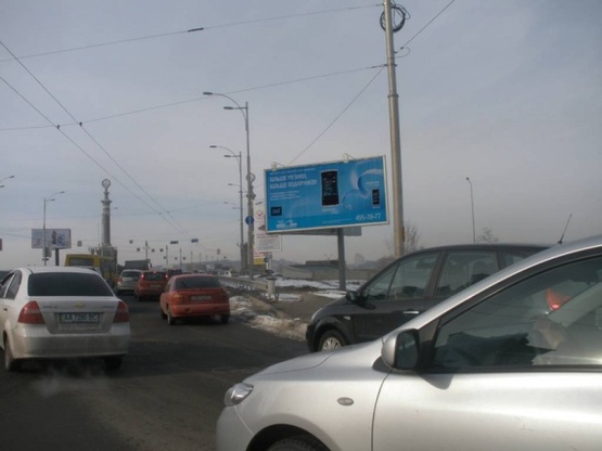 Фото рекламной плоскости по адресу Воссоединения проспект / Русановская Набереж.