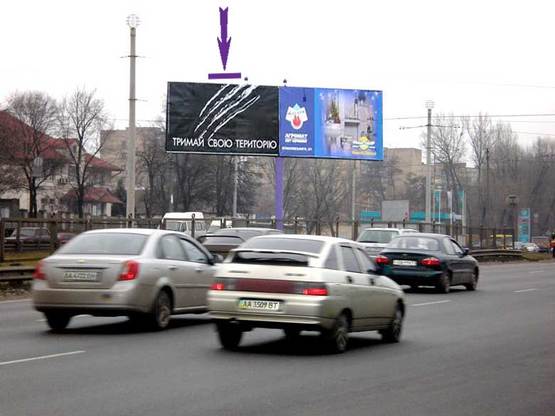 Фото рекламної площини за адресою Кольцевая возле Обойного рынка направление на Одесскую пл. ("чебурашка",левое ухо)