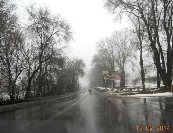 Фото рекламної площини за адресою ул. Интернациональная,  в районе дамбы, выезд из города, сторона А