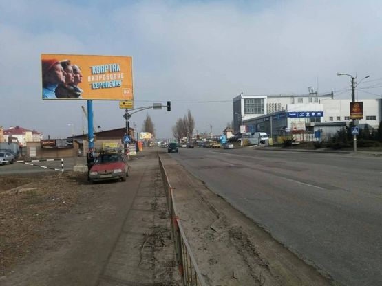 Фото рекламной плоскости по адресу Софиевская Борщаговка, ул.Киевская, напротив Центра занятости (автомобильная дорога Т-10-12 Киев-Боярка)