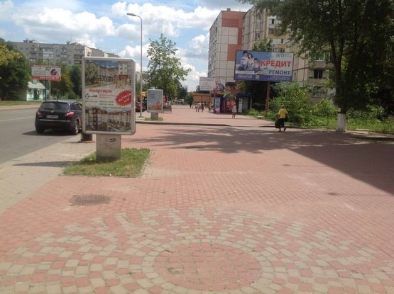 Фото рекламної площини за адресою вул.Жовтнева 20/Зеленая 12, перекресток