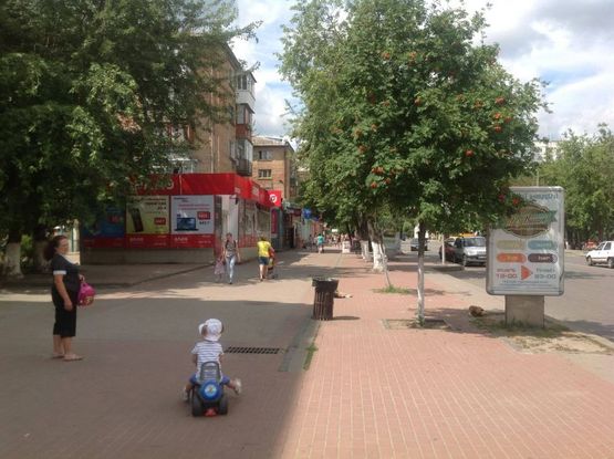 Фото рекламної площини за адресою вул.Жовтнева 18, возле остановки