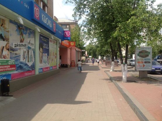 Фото рекламної площини за адресою вул.Жовтнева 14, возле магазина Космо