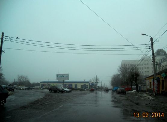 Фото рекламной плоскости по адресу м. Умань, розв'язка з вул. Київська, вул. Тищика та вул. Шевченка (клумба)