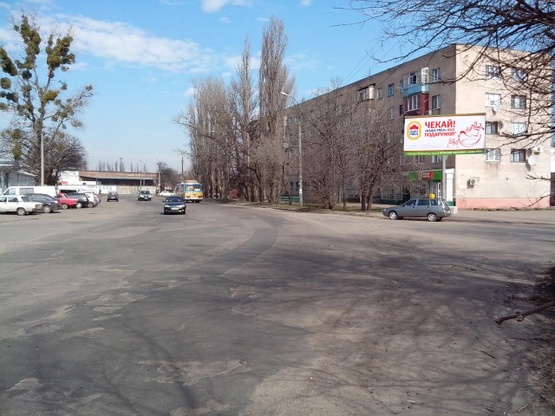 Фото рекламной плоскости по адресу Громова ул., в районе перекрестка с Поднєвича ул., ("ЧеркассыГаз, магазин "Продукты", СТО, "Деливери", УкрГазБанк), направ. в центр