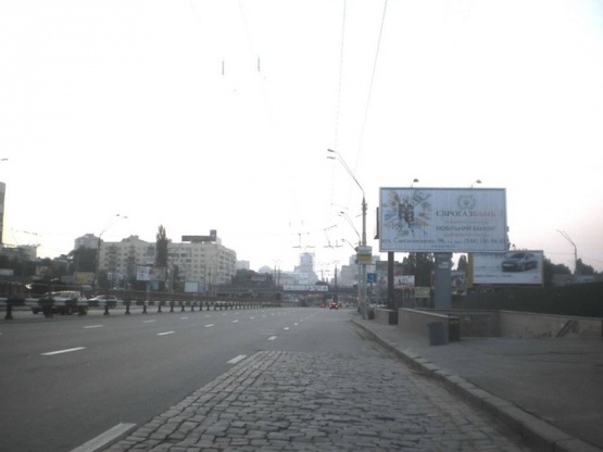 Фото рекламной плоскости по адресу Победы проспект,  за трол. остановка "Центральный  ЗАГС "