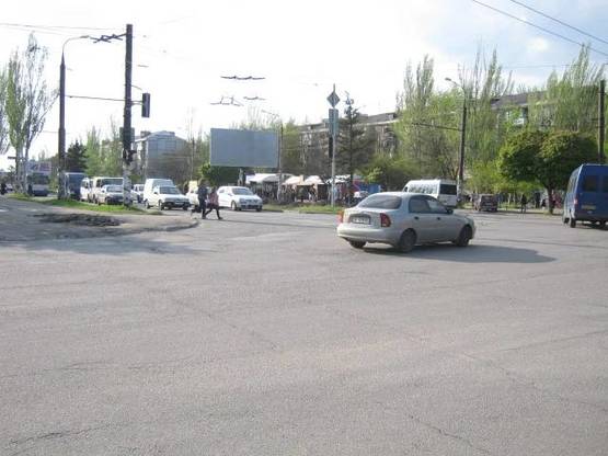 Фото рекламной плоскости по адресу 063_Парамонова д 10 / ул Комарова   (по дороге на пески)