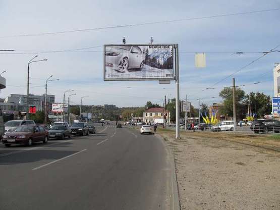 Фото рекламной плоскости по адресу Академіка Білецького вул. - Шевченка вул., 142-а (призма)