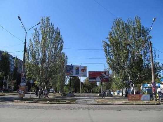 Фото рекламної площини за адресою Леніна просп. - Комсомольська (Центральний р-н) вул. (призма)