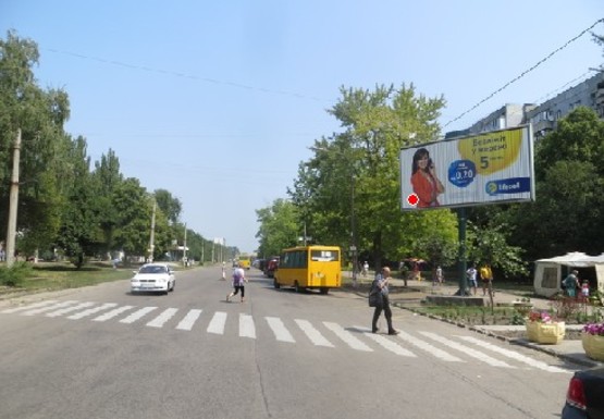 Фото рекламной плоскости по адресу Моторостроителей ул. - Центральный рынок