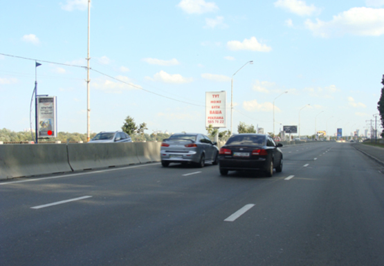 Фото рекламной плоскости по адресу Набережное шоссе (эл. опора № 21)