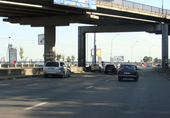 Фото рекламної площини за адресою Набережное шоссе (эл. опора № 80)