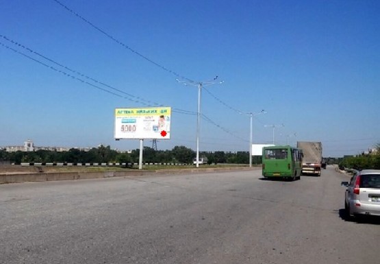 Фото рекламной плоскости по адресу Левобережная ул., мост через Днепр