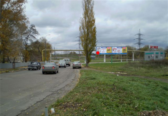 Фото рекламной плоскости по адресу Набережная ул., выезд на мост