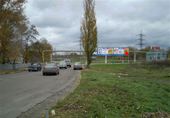 Фото рекламной плоскости по адресу Набережная ул., выезд на мост