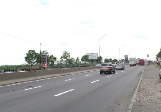 Фото рекламной плоскости по адресу Набережное шоссе (эл. опора № 25-26)