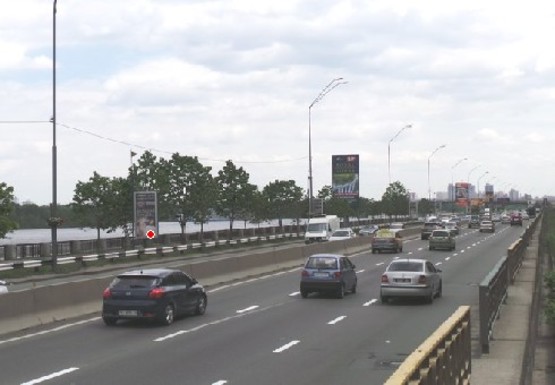 Фото рекламної площини за адресою Набережное шоссе (эл. опора № 29)