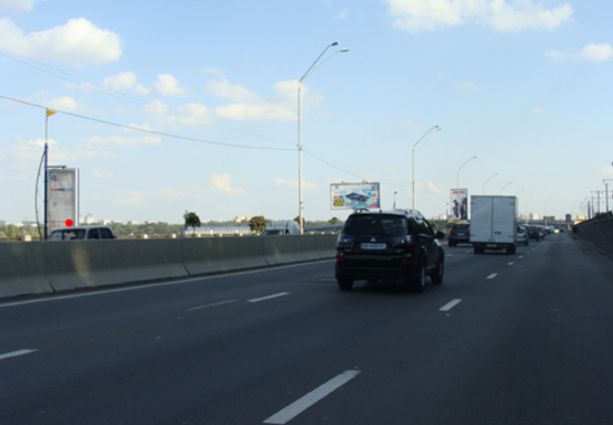 Фото рекламной плоскости по адресу Набережное шоссе (эл. опора № 34-35)