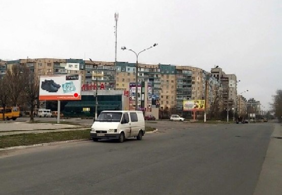 Фото рекламной плоскости по адресу Дружбы Народов пр. - Строителей (рынок)