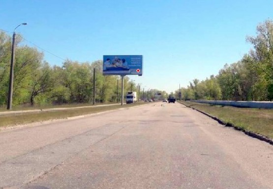 Фото рекламной плоскости по адресу К Усть-Самарскому мосту от Малиновского ул.