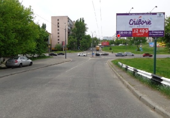Фото рекламной плоскости по адресу Дегтяревская ул., съезд на Довженко ул.