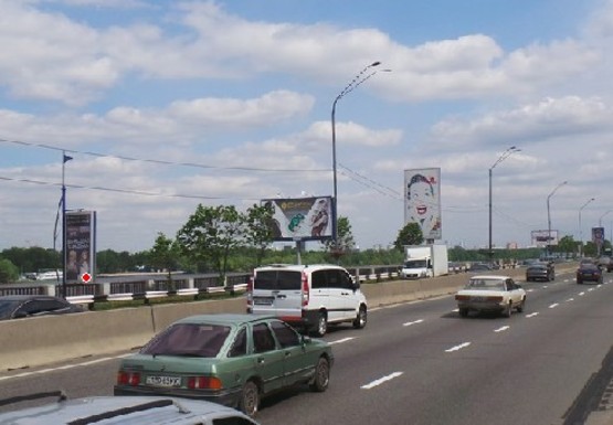 Фото рекламной плоскости по адресу Набережное шоссе (эл. опора № 14-15)