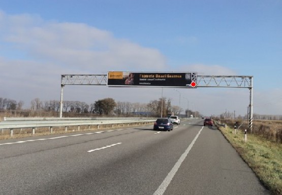 Фото рекламной плоскости по адресу Трасса M-03, Киев - Харьков, 53,050