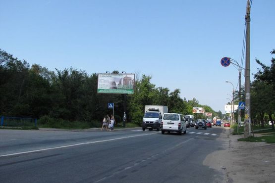 Фото рекламной плоскости по адресу Шевченка Тараса пл., : Мінське шосе; навпроти автостоянки "Полісся" (в напр. Вишгорода)