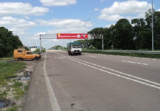 Фото рекламной плоскости по адресу Трасса M-03, Киев - Харьков, 115,200