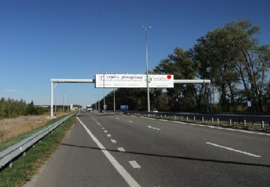 Фото рекламної площини за адресою Трасса M-06, Киев-Житомир, 65,700