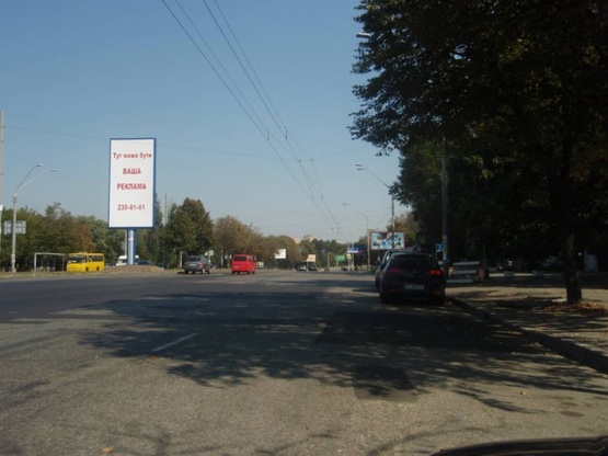Фото рекламної площини за адресою Победы проспект, 65 (разделитель за мостом М "Нивки") по ходу в центр