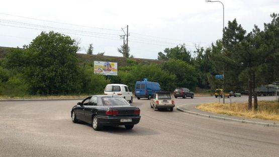 Фото рекламной плоскости по адресу о. Хортица въезд на мост Преображенского, в центр